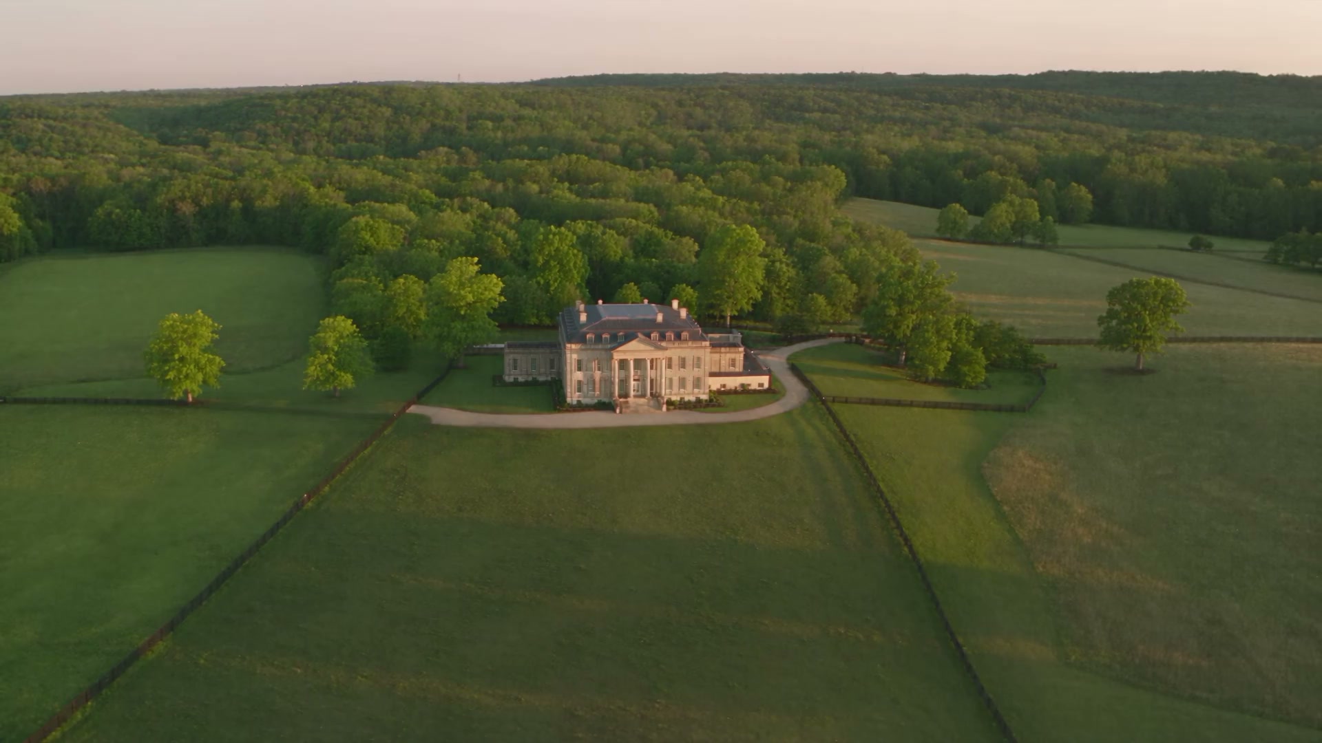 Kentucky horse-country estate seen from the air at first light